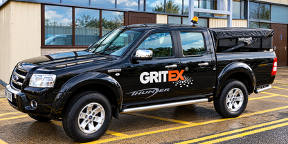 GRITEX Ford Ranger pickup fitted with a SaltDogg SHPE1000 hopper salt spreader
