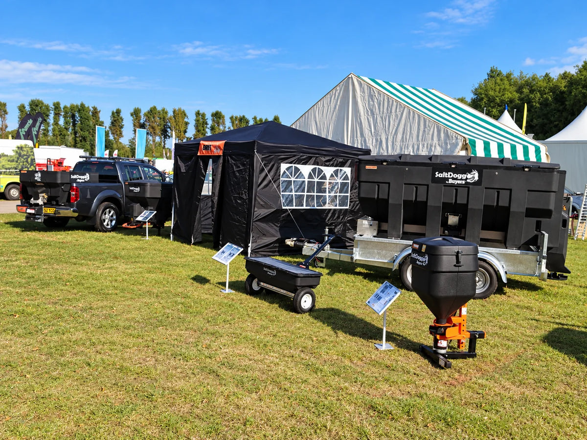 Gritex SaltDogg spreaders displayed at an outdoor event