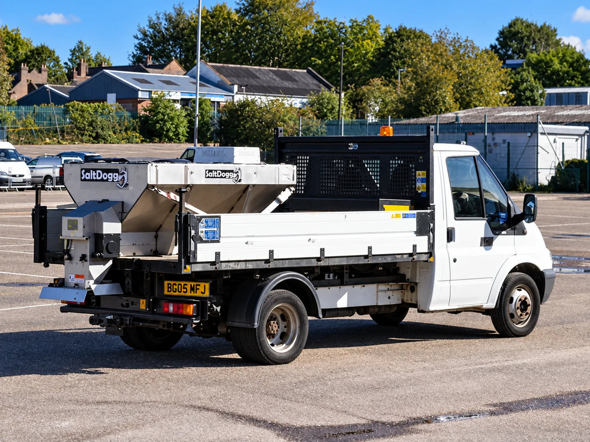 SaltDogg spreader installed on a white tipper truck