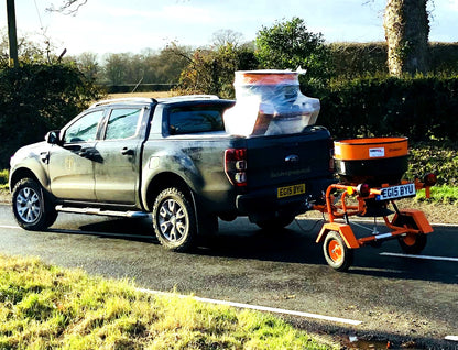 Fuji 250kg towable salt spreader behind customer pickup