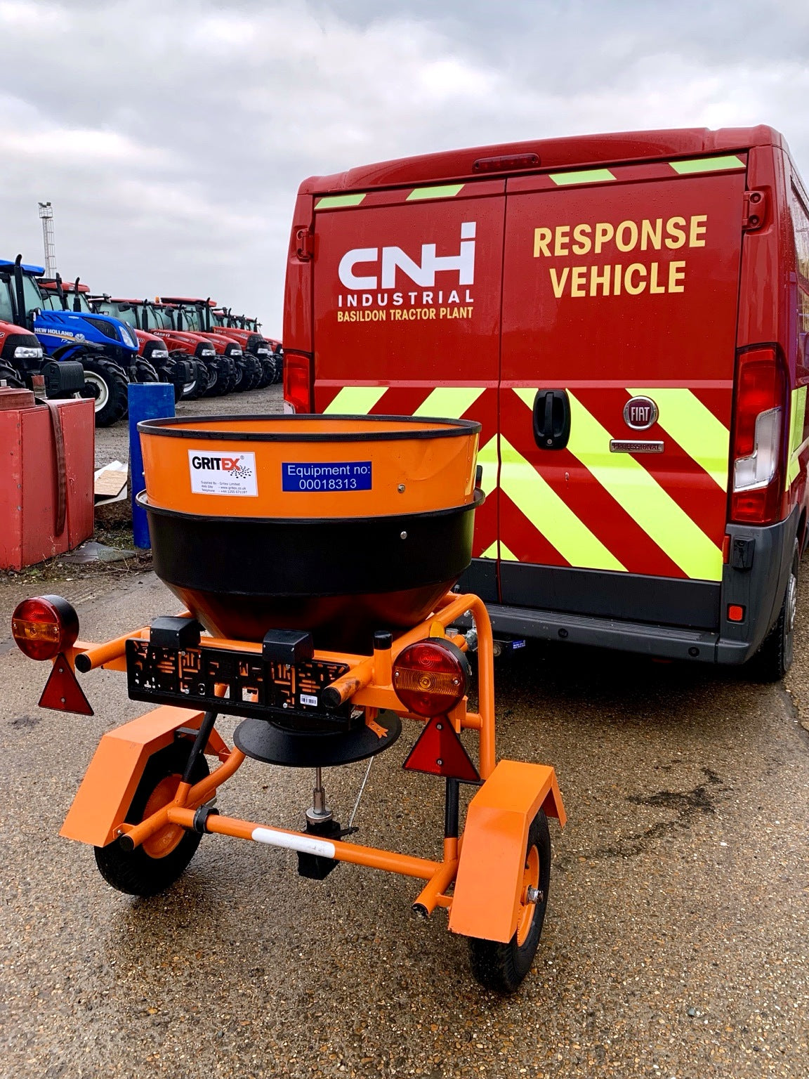 Fuji 250kg towable salt spreader behind customer response van