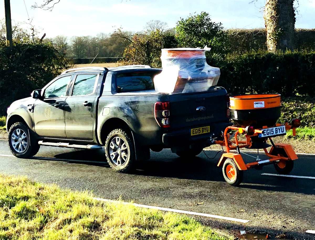 Gritex Fuji towable salt spreader behind a customer pickup