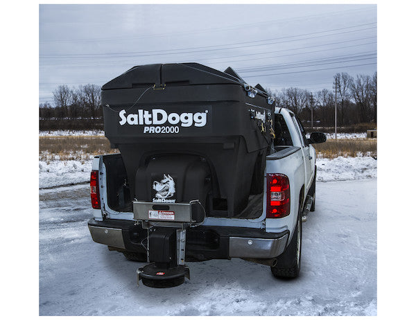 SaltDogg PRO2000 spreader mounted on a pickup truck, rear view