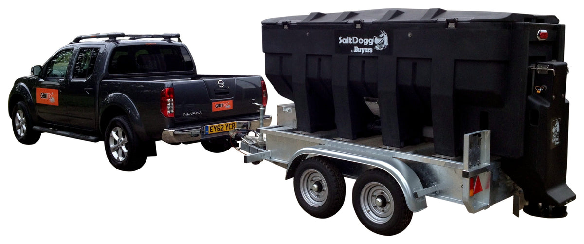 SaltDogg PRO3000CH 2300L spreader on a tandem-axle trailer behind a Gritex Nissan Navara