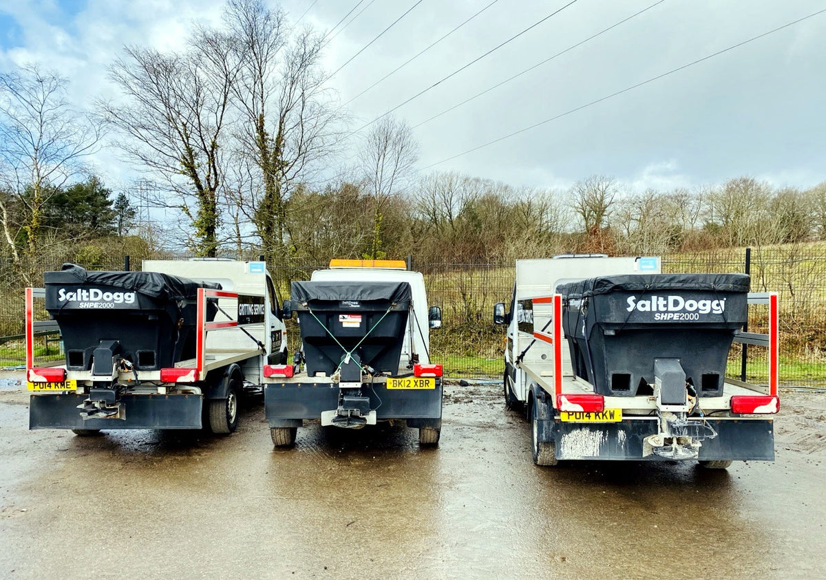 Three vehicles fitted with SaltDogg SHPE2000 1600L hopper salt spreaders