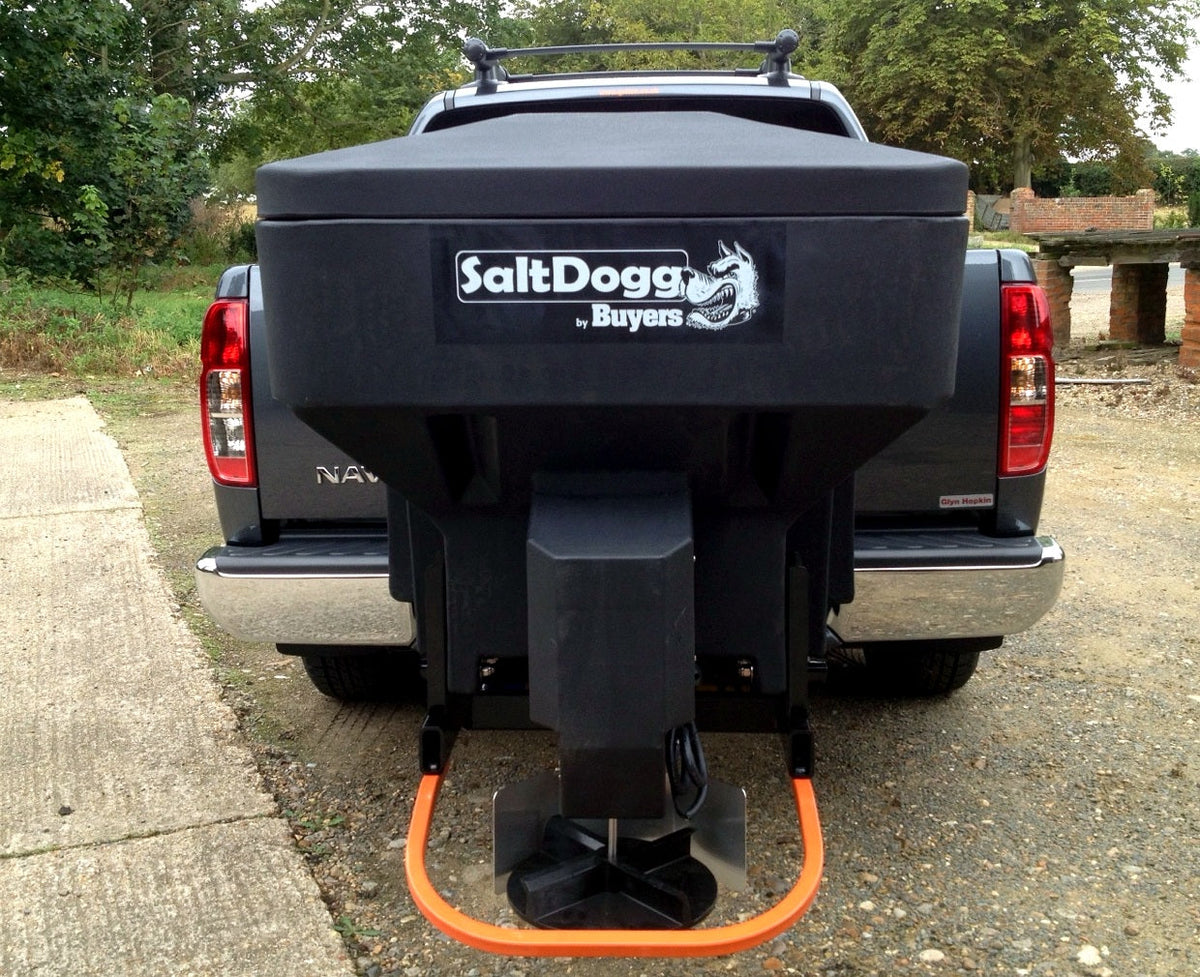 Rear view of SaltDogg TGS03 230L tailgate salt spreader installed on Nissan Navara