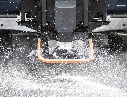 SaltDogg TGS07 315L tailgate salt spreader installed on pickup rear view